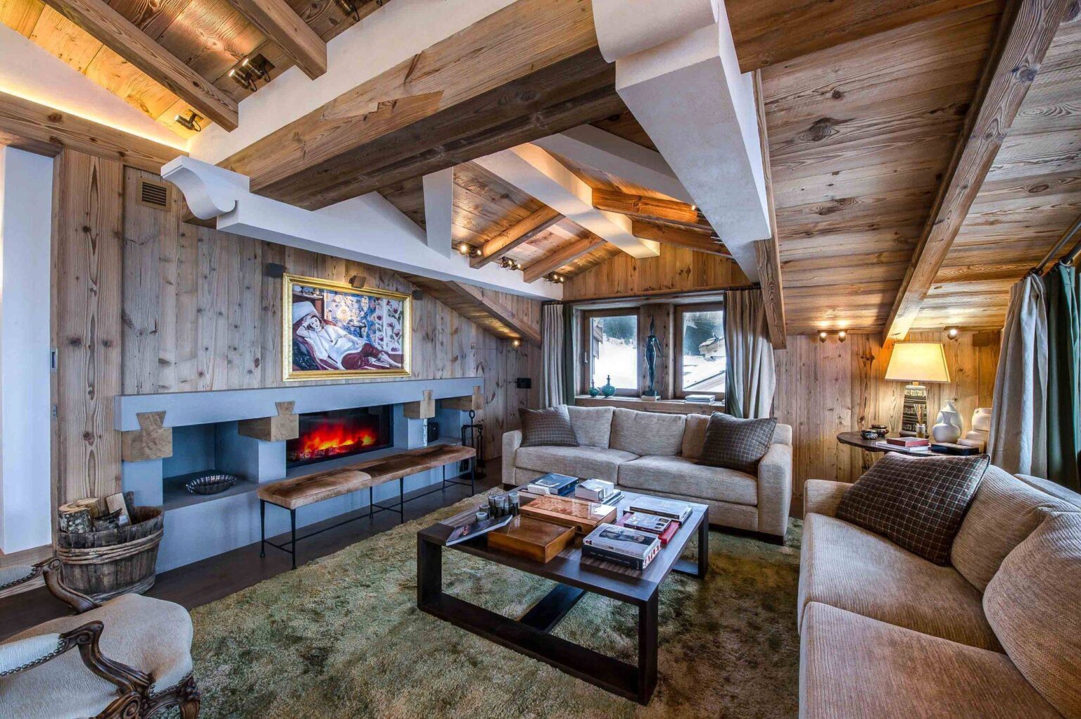 chalet Bastidons Courchevel 1850 living room with fireplace